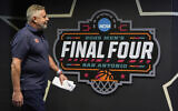 Auburn head coach Bruce Pearl walks to practice during media day at the Final Four of the NCAA college basketball tournament, Thursday, April 3, 2025, in San Antonio. (AP Photo/Brynn Anderson )