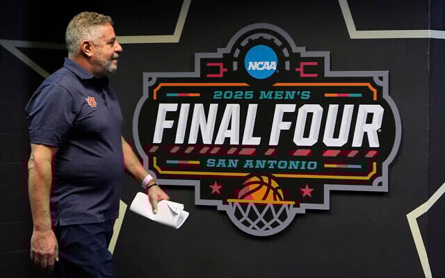 Auburn head coach Bruce Pearl walks to practice during media day at the Final Four of the NCAA college basketball tournament, Thursday, April 3, 2025, in San Antonio. (AP Photo/Brynn Anderson ) Auburn head coach Bruce Pearl walks to practice during media day at the Final Four of the NCAA college basketball tournament, Thursday, April 3, 2025, in San Antonio. (AP Photo/Brynn Anderson )