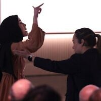 A pro-Palestinian protester against Israel is escorted away by security while interrupting Microsoft AI CEO Mustafa Suleyman during a presentation of the company's AI assistant, Copilot, ahead of a 50th Anniversary presentation at Microsoft headquarters, April 4, 2025, in Redmond, Washington. (AP Photo/Jason Redmond)
