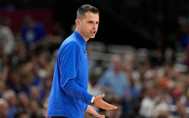 Florida head coach Todd Golden gestures to his team during the second half in the national semifinals at the Final Four of the NCAA college basketball tournament, in San Antonio, April 5, 2025. (Eric Gay/AP) Florida head coach Todd Golden gestures to his team during the second half in the national semifinals at the Final Four of the NCAA college basketball tournament, in San Antonio, April 5, 2025. (Eric Gay/AP)