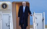 US President Donald Trump walks down the stairs of Air Force One upon his arrival at Joint Base Andrews, Maryland, April 6, 2025. (Luis M. Alvarez/AP)