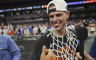 Florida head coach Todd Golden celebrates after Florida beat Houston in the national championship at the Final Four of the NCAA college basketball tournament, Monday, April 7, 2025, in San Antonio. (AP Photo/Eric Gay)