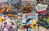 Comic books are displayed in Gene Yang's home on April 1, 2025, in San Jose, California (AP Photo/Tony Avelar)