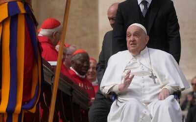 Pope Francis arrives at the end of the mass on Palm Sunday in St. Peter's Square at The Vatican, April 13, 2025. (AP Photo/Gregorio Borgia)