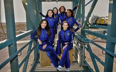 This image provided by Blue Origin shows, first row, seated, from left: Lauren Sanchez and Kerianne Flynn and standing in back from left: Amanda Nguyen, Katy Perry, Gayle King and Aisha Bowe in West Texas. (Blue Origin via AP)