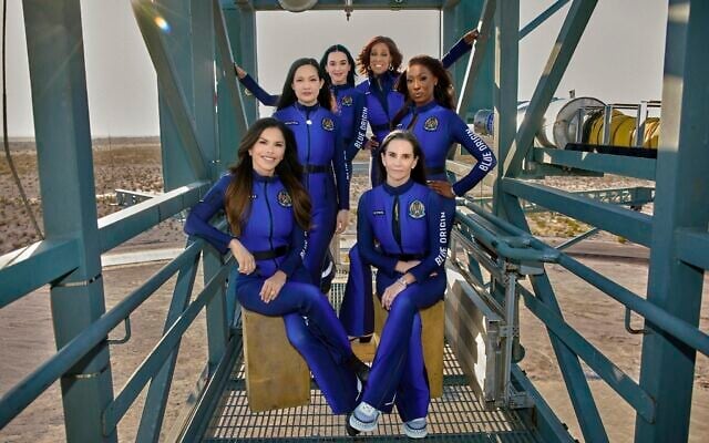 This image provided by Blue Origin shows, first row, seated, from left: Lauren Sanchez and Kerianne Flynn and standing in back from left: Amanda Nguyen, Katy Perry, Gayle King and Aisha Bowe in West Texas. (Blue Origin via AP) This image provided by Blue Origin shows, first row, seated, from left: Lauren Sanchez and Kerianne Flynn and standing in back from left: Amanda Nguyen, Katy Perry, Gayle King and Aisha Bowe in West Texas. (Blue Origin via AP)
