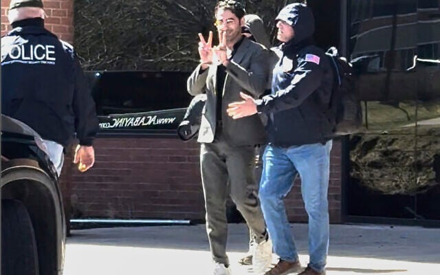 This image taken from a video provided by Christopher Helali shows Mohsen Mahdawi, an anti-Israel protest leader at Columbia University, being detained at the US Citizenship and Immigration Services office in Colchester, Vt., April 14, 2025. (Christopher Helali via AP) This image taken from a video provided by Christopher Helali shows Mohsen Mahdawi, an anti-Israel protest leader at Columbia University, being detained at the US Citizenship and Immigration Services office in Colchester, Vt., April 14, 2025. (Christopher Helali via AP)