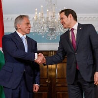 US Secretary of State Marco Rubio, right, shakes hands with Jordanian Prime Minister Jafar Hassan during a photo opportunity at the State Department, Tuesday, April 15, 2025, in Washington. (AP Photo/Rod Lamkey, Jr.)