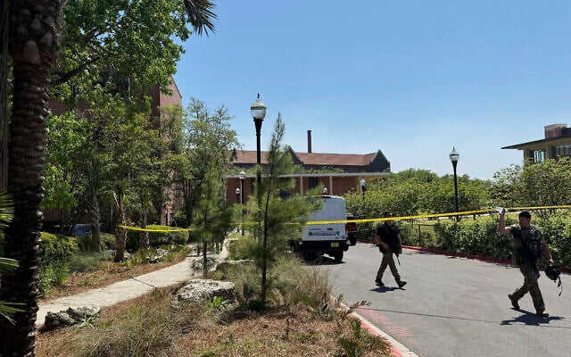 Dozens of patrol vehicles, including a forensics van, are stationed outside of Florida State University’s student union building, the scene of a shooting, April 17, 2025, in Tallahassee, Florida. (AP Photo/Kate Payne) Dozens of patrol vehicles, including a forensics van, are stationed outside of Florida State University’s student union building, the scene of a shooting, April 17, 2025, in Tallahassee, Florida. (AP Photo/Kate Payne)