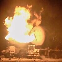 Photo taken from video released by Al Masirah TV channel shows a burning oil tanker after US airstrikes targeted the Ras Isa oil port held by Yemen's Houthi rebels in Hodeida, Yemen, April 18, 2025.( Al Masirah TV via AP)