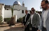 Accompanied by unidentified members of the delegation, U.S. congressman Cory Mills (R-FL), second from right, walks in the Old City of Damascus Friday, April 18, 2025. (AP Photo/Omar Sanadiki)