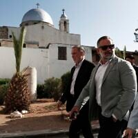 Accompanied by unidentified members of the delegation, U.S. congressman Cory Mills (R-FL), second from right, walks in the Old City of Damascus Friday, April 18, 2025. (AP Photo/Omar Sanadiki)