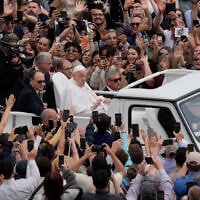 Pope Francis tours St. Peter's Square in his popemobile after bestowing the Urbi et Orbi (Latin for to the city and to the world) blessing at the end of the Easter mass presided over by Cardinal Angelo Comastri in St. Peter's Square at the Vatican, April 20, 2025.(AP Photo/Gregorio Borgia)
