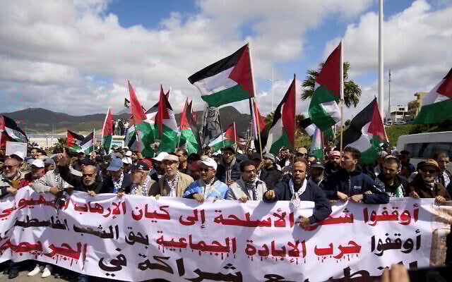 Moroccans protest the docking of a Maersk cargo ship carrying airplane parts they suspect are headed to Israel, outside Tangier Med Port, April 20, 2025. Banner in Arabic reads 'Stop shipping weapons to the terrorist Zionist entity.' (AP/Mosa'ab Elshamy) Moroccans protest the docking of a Maersk cargo ship carrying airplane parts they suspect are headed to Israel, outside Tangier Med Port, April 20, 2025. Banner in Arabic reads 'Stop shipping weapons to the terrorist Zionist entity.' (AP/Mosa'ab Elshamy)