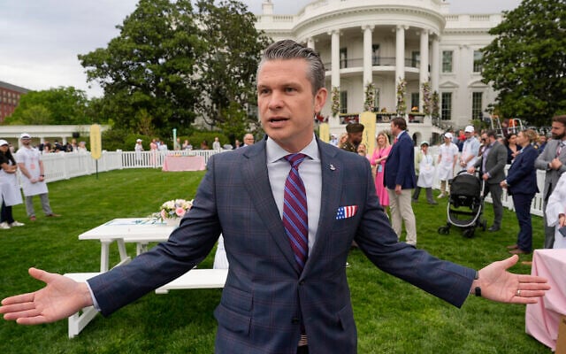 US Defense Secretary Pete Hegseth speaks on the South Lawn of the White House before President Donald Trump and First Lady Melania Trump participate in the White House Easter Egg Roll, April 21, 2025, in Washington. (AP Photo/Alex Brandon)