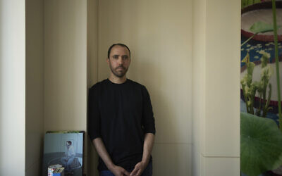 Freed Israeli hostage Tal Shoham, who was held by Hamas in the Gaza Strip, poses for a portrait in Tel Aviv, April 22, 2025. (AP Photo/Maya Alleruzzo)