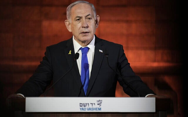 Israeli Prime Minister Benjamin Netanyahu speaks during the opening ceremony of the Holocaust Remembrance Day at the Yad Vashem Holocaust Memorial Museum in Jerusalem on Wednesday, April 23, 2025. (AP Photo/Leo Correa)