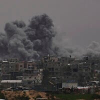 Smoke rises to the sky following an Israeli strike in Khan Younis, Gaza Strip, April 24, 2025. (AP Photo/Abdel Kareem Hana)
