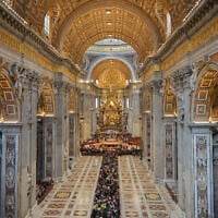 People line up to pay their respects to Pope Francis lying in state, inside St. Peter's Basilica, at the Vatican,April 25, 2025. (AP Photo/Andrew Medichini)