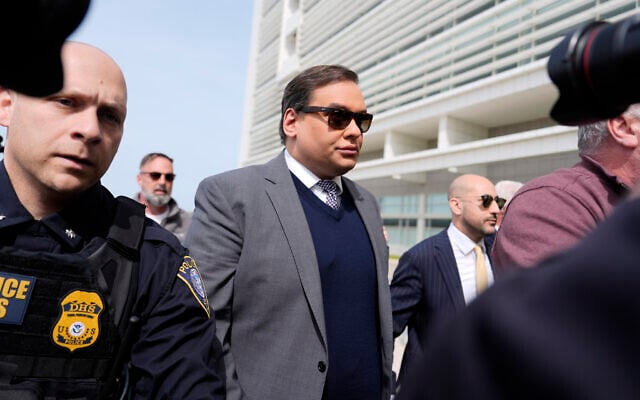 Former US Rep. George Santos arrives at federal court for sentencing, Friday, April 25, 2025, in Central Islip, NY (AP Photo/Julia Demaree Nikhinson) Former US Rep. George Santos arrives at federal court for sentencing, Friday, April 25, 2025, in Central Islip, NY (AP Photo/Julia Demaree Nikhinson)