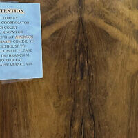 A sign is posted outside Judge Hannah Dugan courtroom at the Milwaukee County courthouse, on April 25, 2025 in Milwaukee. (Scott Bauer via AP)