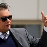 Former US Rep. George Santos leaves federal court after being sentenced to more than seven years in prison for fraud and identity theft, Friday, April 25, 2025, in Central Islip, N.Y. (AP Photo/Julia Demaree Nikhinson)
