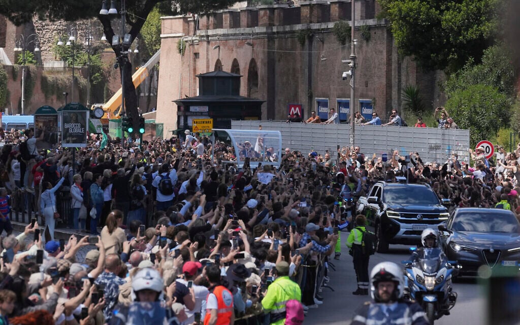 The coffin of Pope Francis is transported on its way to St. Mary Major for burial, Saturday, April 26, 2025. (AP Photo/Antonio Calanni)