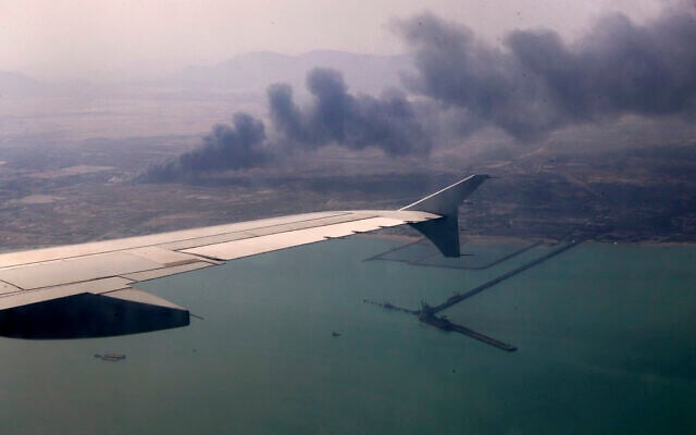 In this photo released by the Iranian Presidency Office, smoke rises in the sky on April 27, 2025 after a massive explosion and fire rocked a port near the southern port city of Bandar Abbas, Iran, on Saturday. (Iranian Presidency Office via AP) In this photo released by the Iranian Presidency Office, smoke rises in the sky on April 27, 2025 after a massive explosion and fire rocked a port near the southern port city of Bandar Abbas, Iran, on Saturday. (Iranian Presidency Office via AP)