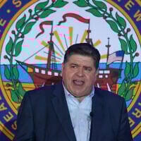 Illinois Gov. J.B. Pritzker speaks during the McIntyre-Shaheen 100 Club Dinner, in Manchester, New Hampshire, April 27, 2025. (Reba Saldanha/AP)