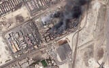 This satellite photo from Planet Labs PBC shows the epicenter of an explosion at the Shahid Rajaei port near Bandar Abbas, Iran, April 28, 2025. (Planet Labs PBC via AP)