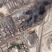 This satellite photo from Planet Labs PBC shows the epicenter of an explosion at the Shahid Rajaei port near Bandar Abbas, Iran, April 28, 2025. (Planet Labs PBC via AP)