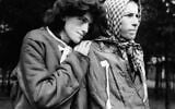 Two young women who managed to survive over a year in concentration camp at Belsen, Germany, are shown, April 30, 1945. (AP Photo)