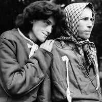 Two young women who managed to survive over a year in concentration camp at Belsen, Germany, are shown, April 30, 1945. (AP Photo)