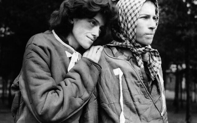 Two young women who managed to survive over a year in concentration camp at Belsen, Germany, are shown, April 30, 1945. (AP Photo)