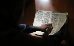 Ancient Syriac manuscript from the private collection of Raad Abdul-Ahed from the Kurdish city of Dohuk, northern Iraq, as photographed in 2015. (AP Photo/Bram Janssen)