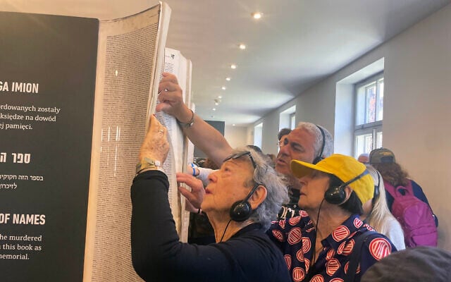 Survivors Susan Rosenberg finds her uncle‘s name in the Book of Names in Auschwitz on April 23, 2025 (Jessica Steinberg/Times of Israel) Survivors Susan Rosenberg finds her uncle‘s name in the Book of Names in Auschwitz on April 23, 2025 (Jessica Steinberg/Times of Israel)