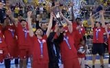 Members of the Hapoel Tel Aviv basketball team celebrate their EuroCup tournament victory, April 11, 2025, after defeating Spanish squad Gran Canaria in the finals. (YouTube screenshot)