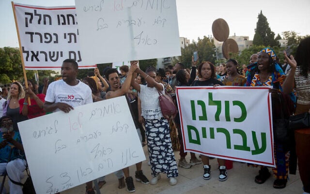 Members of the Hebrew Israelite community protest against deportation orders, at Habima Square in Tel Aviv, June 1, 2021. (Miriam Alster/Flash90) Members of the Hebrew Israelite community protest against deportation orders, at Habima Square in Tel Aviv, June 1, 2021. (Miriam Alster/Flash90)
