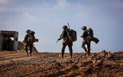Israeli soldiers operating in Beit Lahia, in the northern Gaza Strip, on November 28, 2024 (Oren Cohen/Flash90)