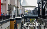 People shop at the BIG Fashion Mall in Glilot, central Israel, March 4, 2025 (Tal Gal/Flash90)