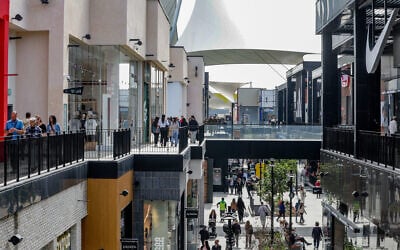 People shopat the BIG Fashion Mall in Glilot, central Israel, March 4, 2025. (Tal Gal/Flash90)