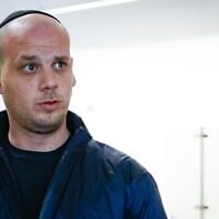 Eli Feldstein arrives for a court hearing at the Tel Aviv District Court on March 11, 2025. (Yehoshua Yosef/Flash90)