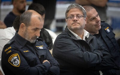 Israel Police chief Daniel Levy (left) and National Security Minister Itamar Ben Gvir during a display of weapons seized during police operations, in Beit Shemesh, April 9, 2025. (Chaim Goldberg/Flash90)