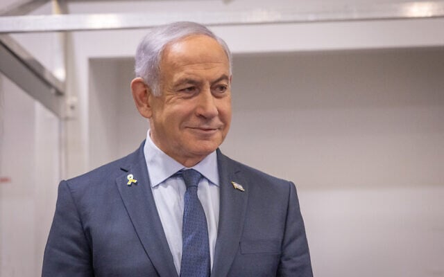 Prime Minister Benjamin Netanyahu arrives at the Tel Aviv District Court to give testimony in his ongoing criminal trial, April 9, 2025. (Miriam Alster/Flash90)