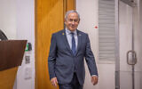 Prime Minister Benjamin Netanyahu arrives at the Tel Aviv District Court for testimony in the corruption trial against him, April 9, 2025. (Miriam Alster/Flash90)
