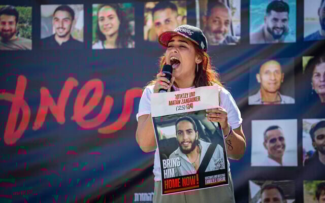 Ilana Gritzewsky shouts to hostage partner Matan Zangauker near the border with Gaza, April 20, 2025 (Erik Marmor/Flash90) Ilana Gritzewsky shouts to hostage partner Matan Zangauker near the border with Gaza, April 20, 2025 (Erik Marmor/Flash90)