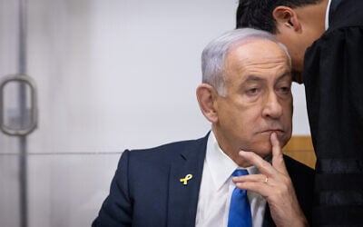 Prime Minister Benjamin Netanyahu is seen at the Tel Aviv District Court for the ongoing corruption trial against him, on April 22, 2025. (Miriam Alster/Flash90)