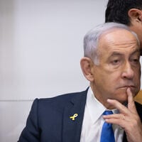 Prime Minister Benjamin Netanyahu is seen at the Tel Aviv District Court for the ongoing corruption trial against him, on April 22, 2025. (Miriam Alster/Flash90)