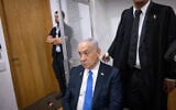 Prime Minister Benjamin Netanyahu at the courtroom in the Tel Aviv District Court before the start of a hearing in his trial, April 22, 2025 (Miriam Alster/Flash90)