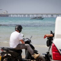 Search and rescue teams search for a diver who has been missing since he was attacked by sharks near the beach in Hadera, April 22, 2025. (Tal Gal/FLASH90)